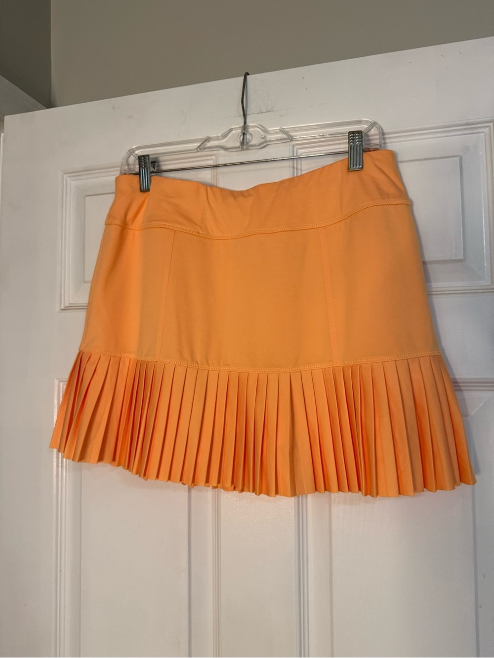 Jofit Pleated Mini Skirt in Bright Orange